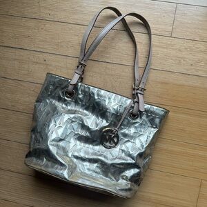 Gold Michael Kors logo purse